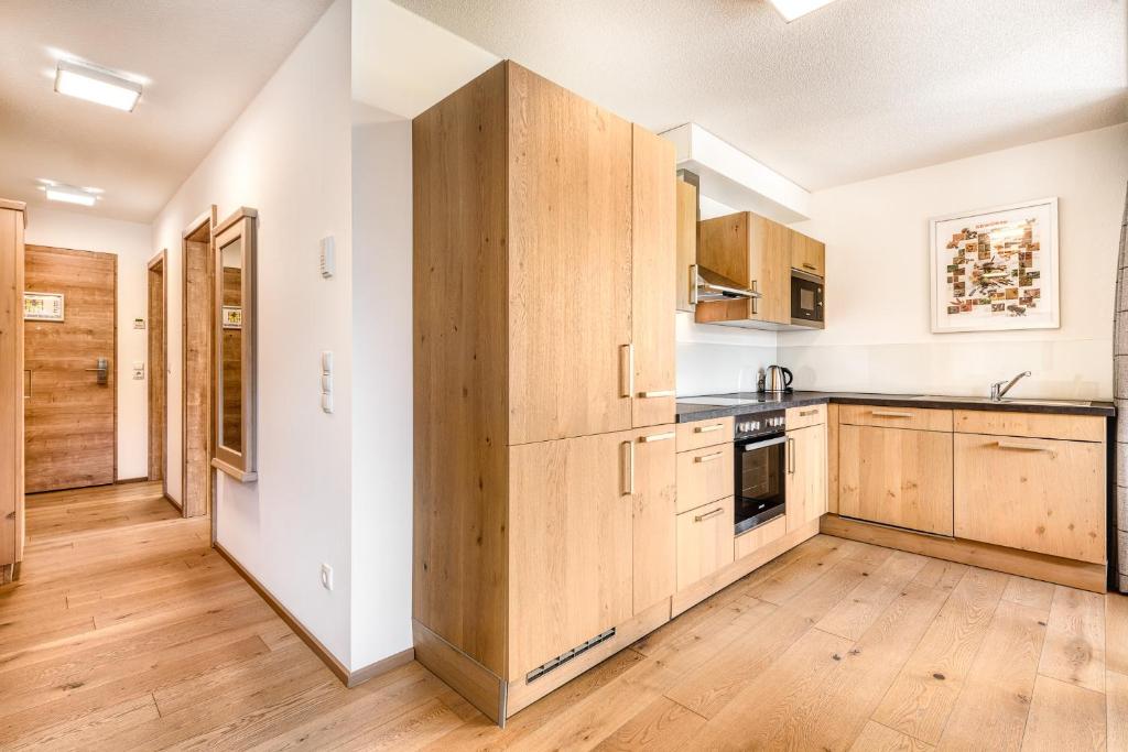 Kuchyň nebo kuchyňský kout v ubytování Appartements im Kirchberg by A-Appartments