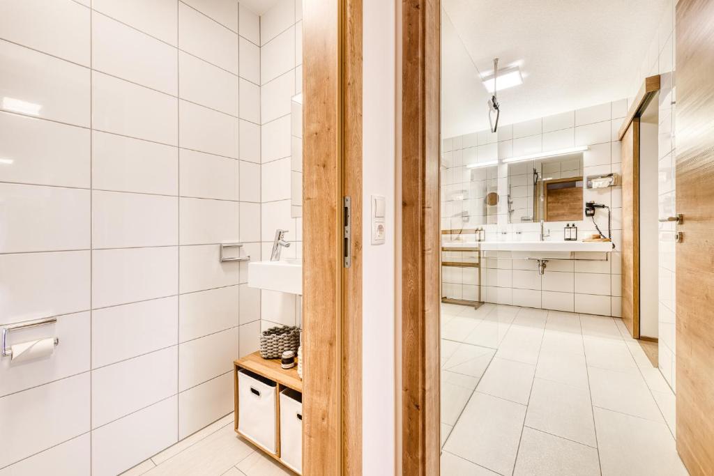 Koupelna v ubytování Appartements im Kirchberg by A-Appartments