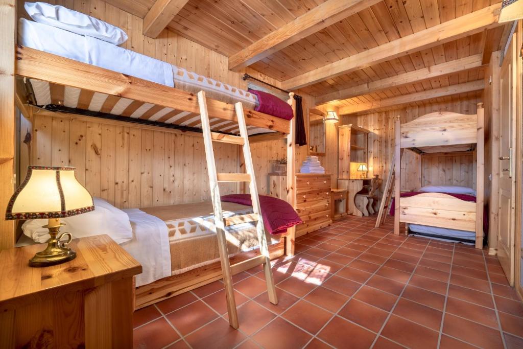 Posteľ alebo postele v izbe v ubytovaní Chalet indipendente Mas Tarlenta nel Parco Nazionale dello Stelvio
