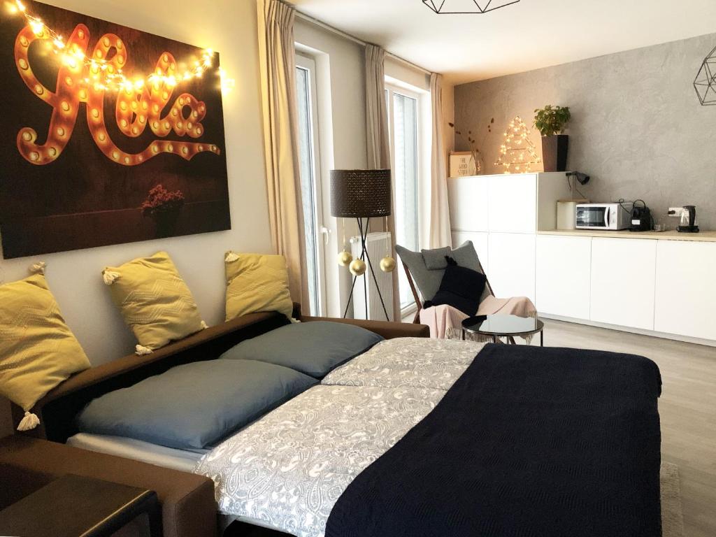 Posezení v ubytování Jezerní apartmán s terasou a saunou v Lakepark Residence