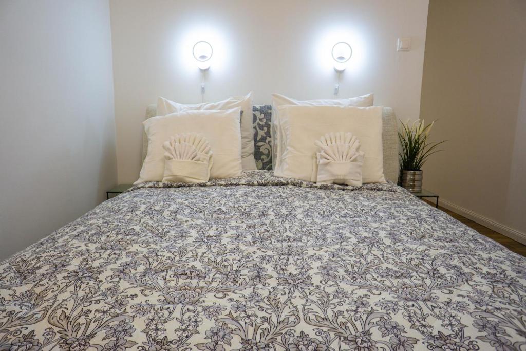 Posteľ alebo postele v izbe v ubytovaní Cosy Casa