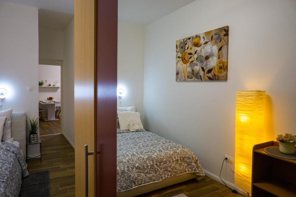 Posteľ alebo postele v izbe v ubytovaní Cosy Casa