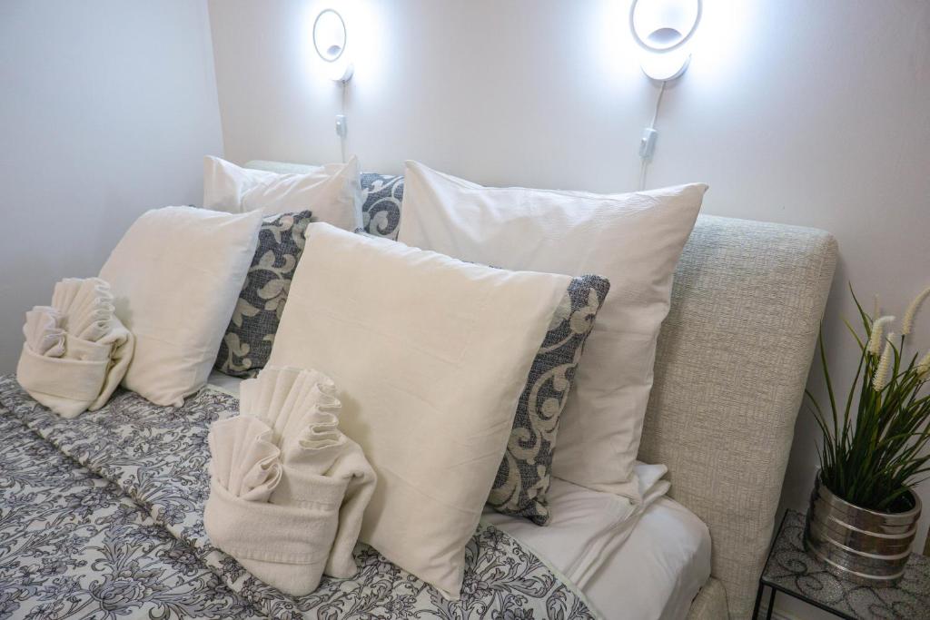 Posteľ alebo postele v izbe v ubytovaní Cosy Casa