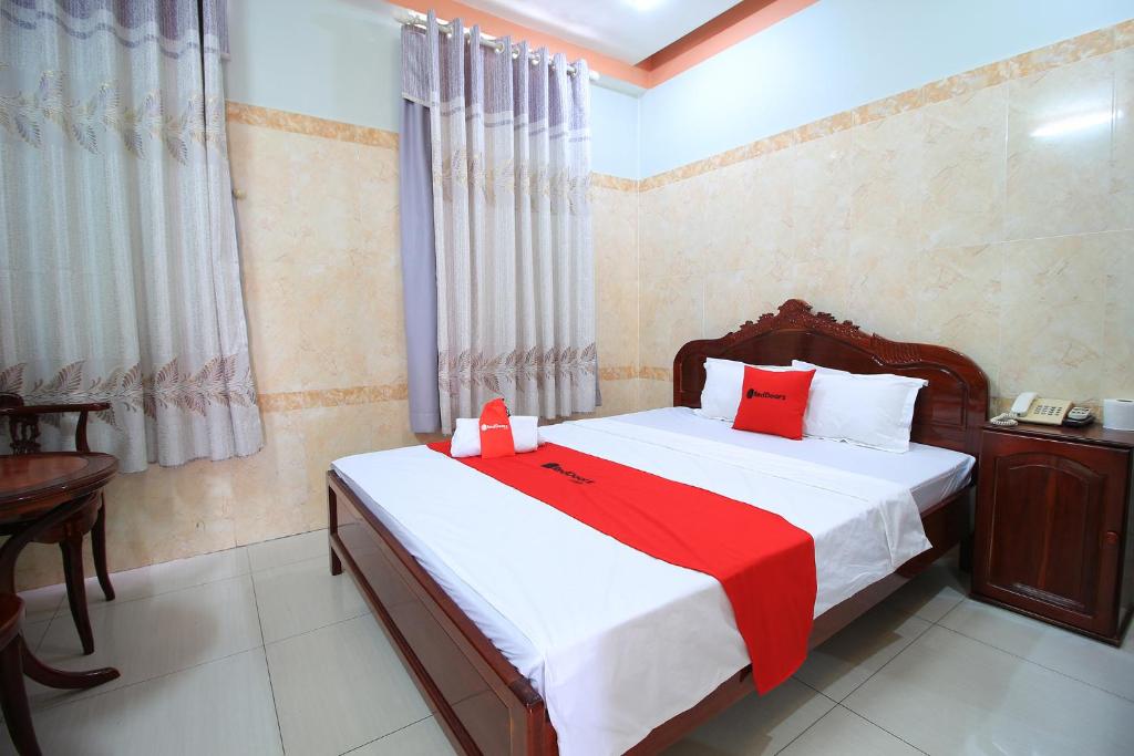Postel nebo postele na pokoji v ubytování Chin Sao Hotel Nguyen Thi Thap