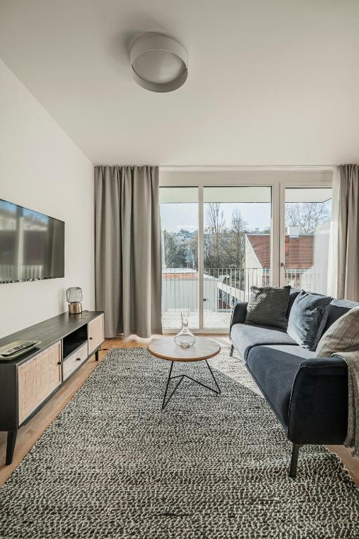 Telewizja i/lub zestaw kina domowego w obiekcie Arbio I Liv's Place Lux Apartments