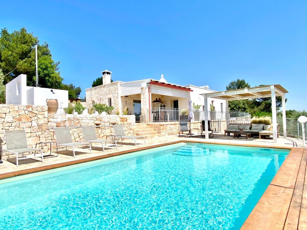 The swimming pool at or close to Trullo Falco
