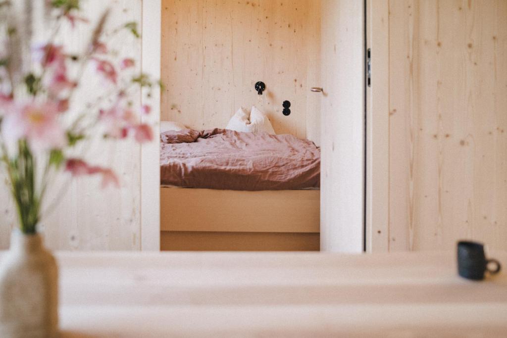 Postel nebo postele na pokoji v ubytování Pinjola
