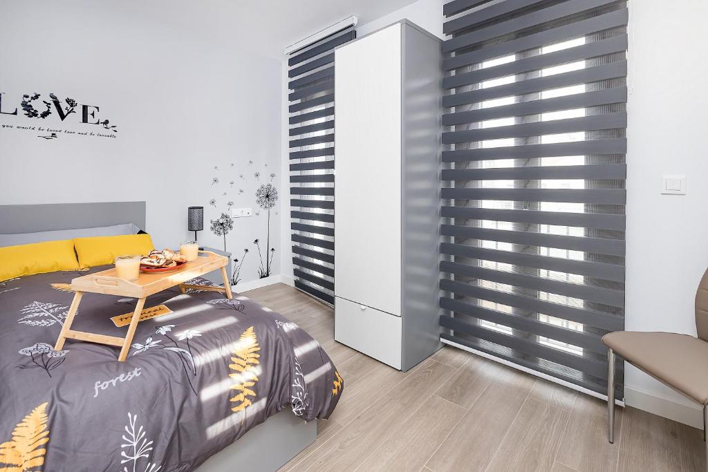 Posteľ alebo postele v izbe v ubytovaní BHost - Regina