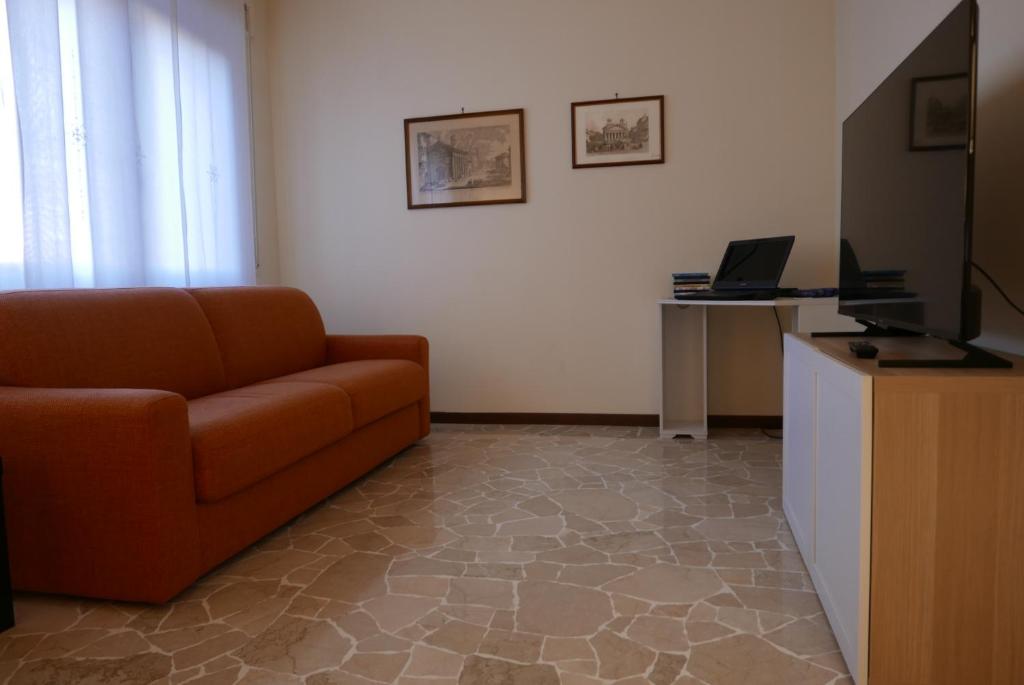 Telewizja i/lub zestaw kina domowego w obiekcie Residenza Feltre