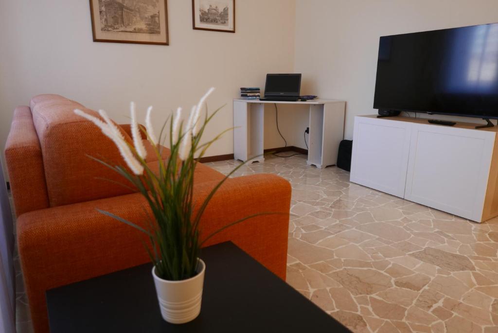 Telewizja i/lub zestaw kina domowego w obiekcie Residenza Feltre