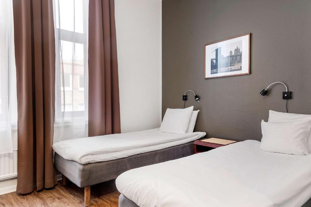 Postel nebo postele na pokoji v ubytování Best Western Tidbloms Hotel