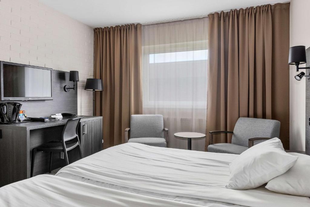 Postel nebo postele na pokoji v ubytování Best Western Hotel Scheele