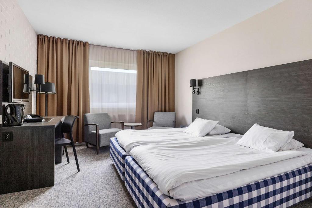 Postel nebo postele na pokoji v ubytování Best Western Hotel Scheele
