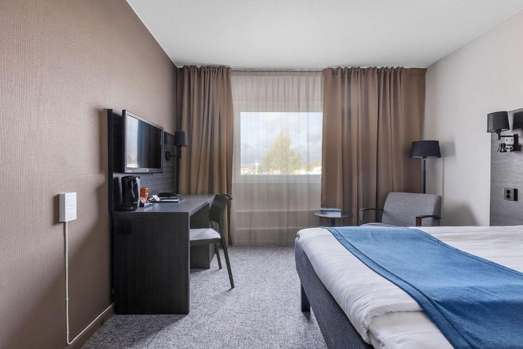 TV a/nebo společenská místnost v ubytování Best Western Hotel Scheele