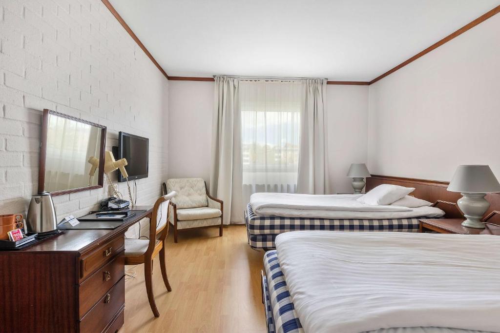 Postel nebo postele na pokoji v ubytování Best Western Hotel Scheele