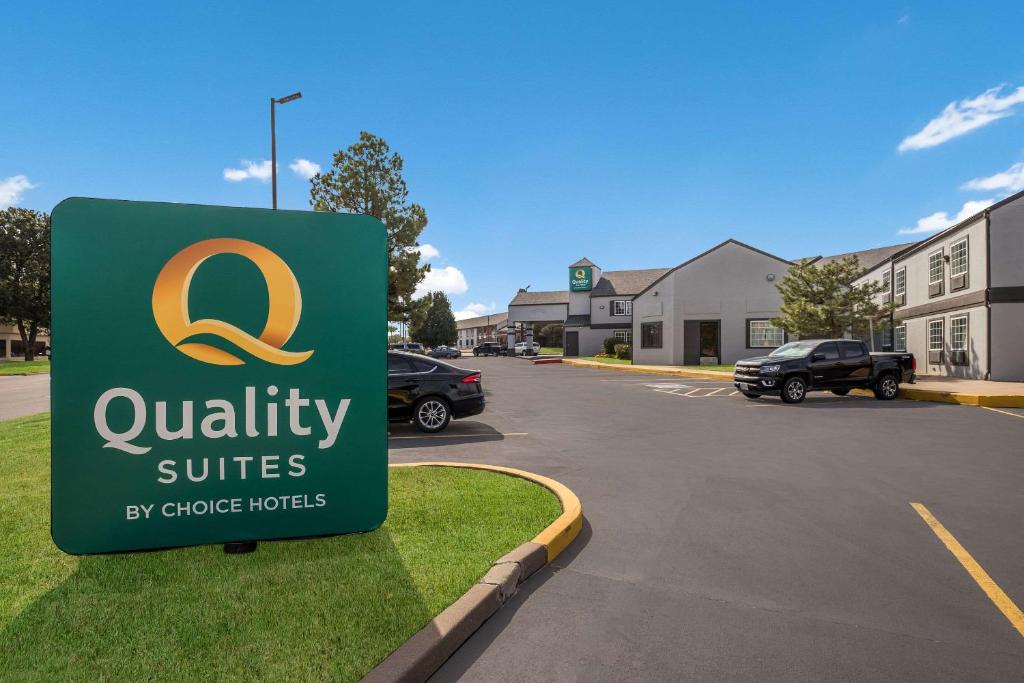 a sign for a q authorityccessccessccess at Quality Suites I-44 in Tulsa