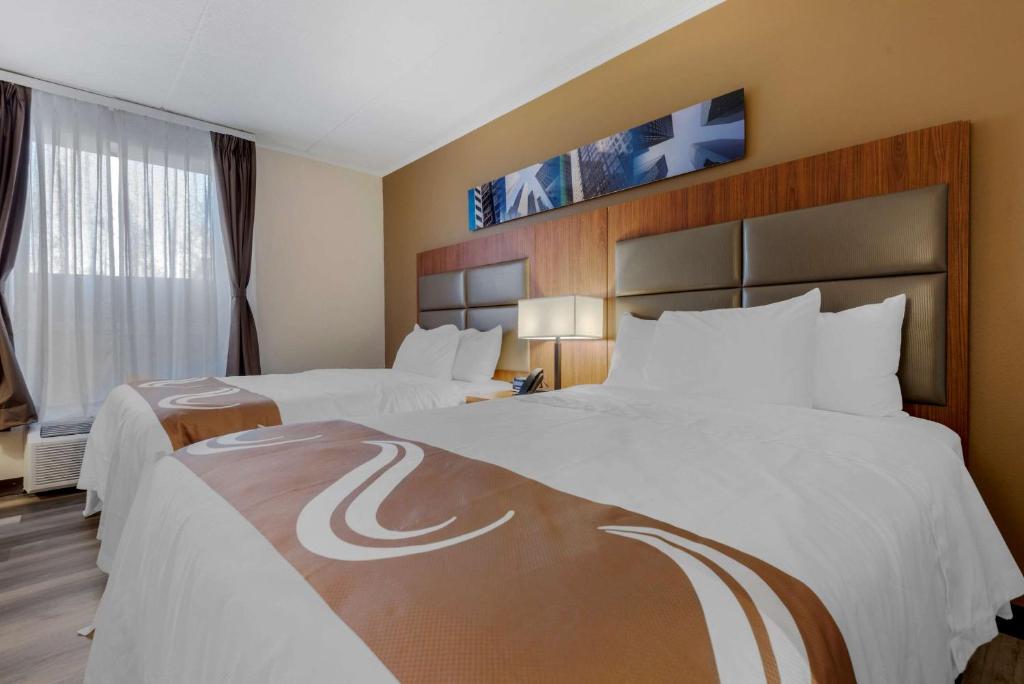 Postel nebo postele na pokoji v ubytování Quality Inn & Suites New Hartford - Utica
