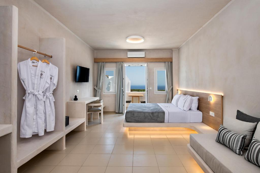 Postel nebo postele na pokoji v ubytování Aelia Luxury Suites