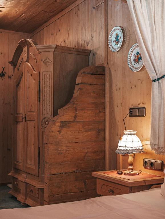 Postel nebo postele na pokoji v ubytování Hotel Mitterhof