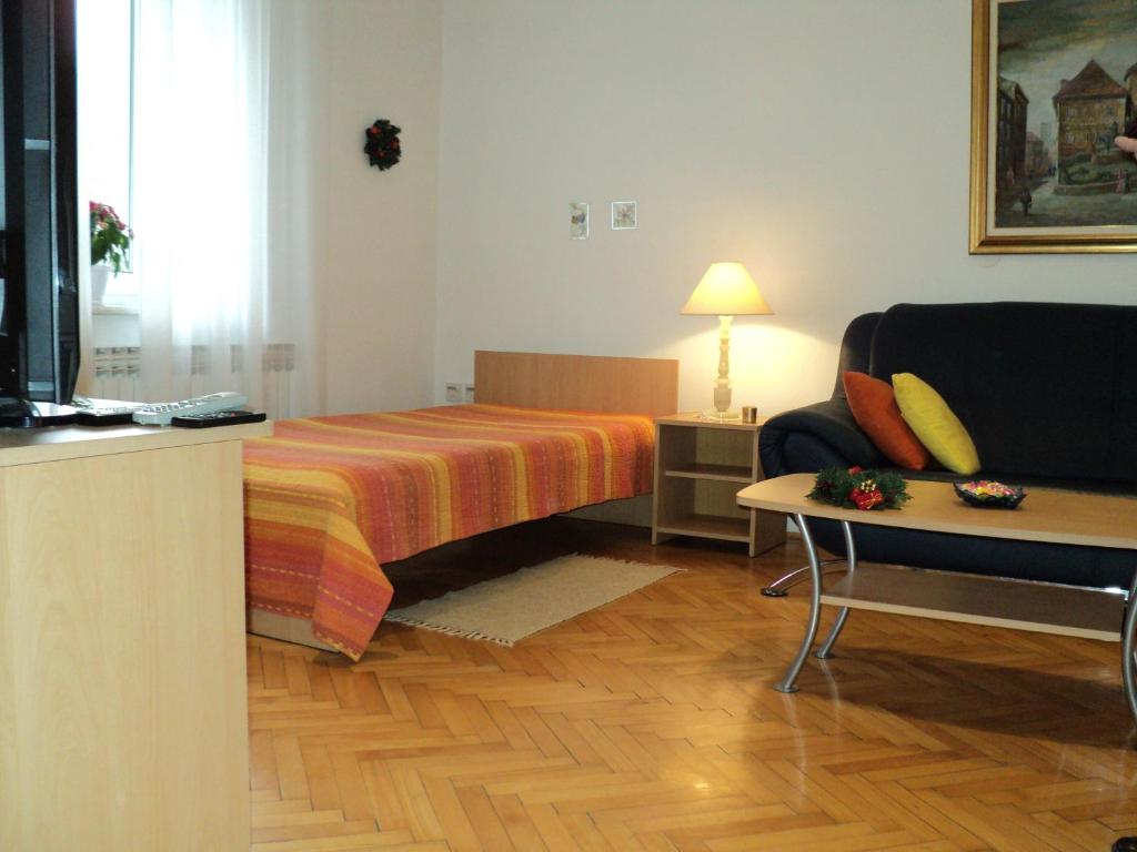 Łóżko lub łóżka w pokoju w obiekcie Apartment Horvat
