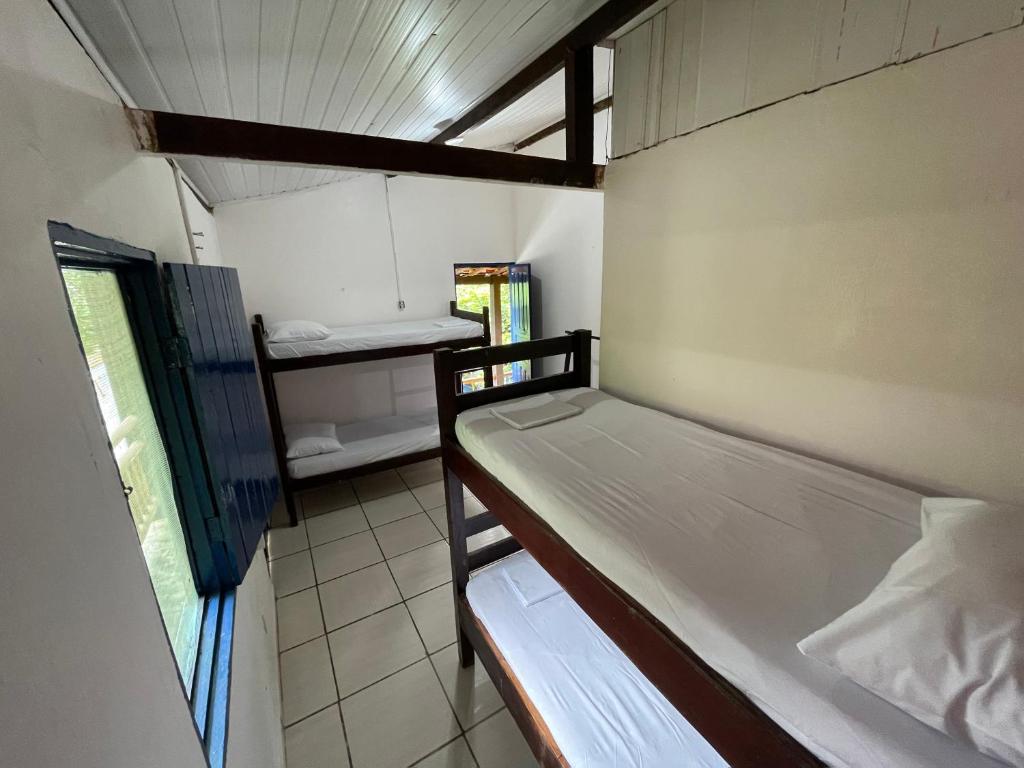 Postel nebo postele na pokoji v ubytování Ooxe Hostel