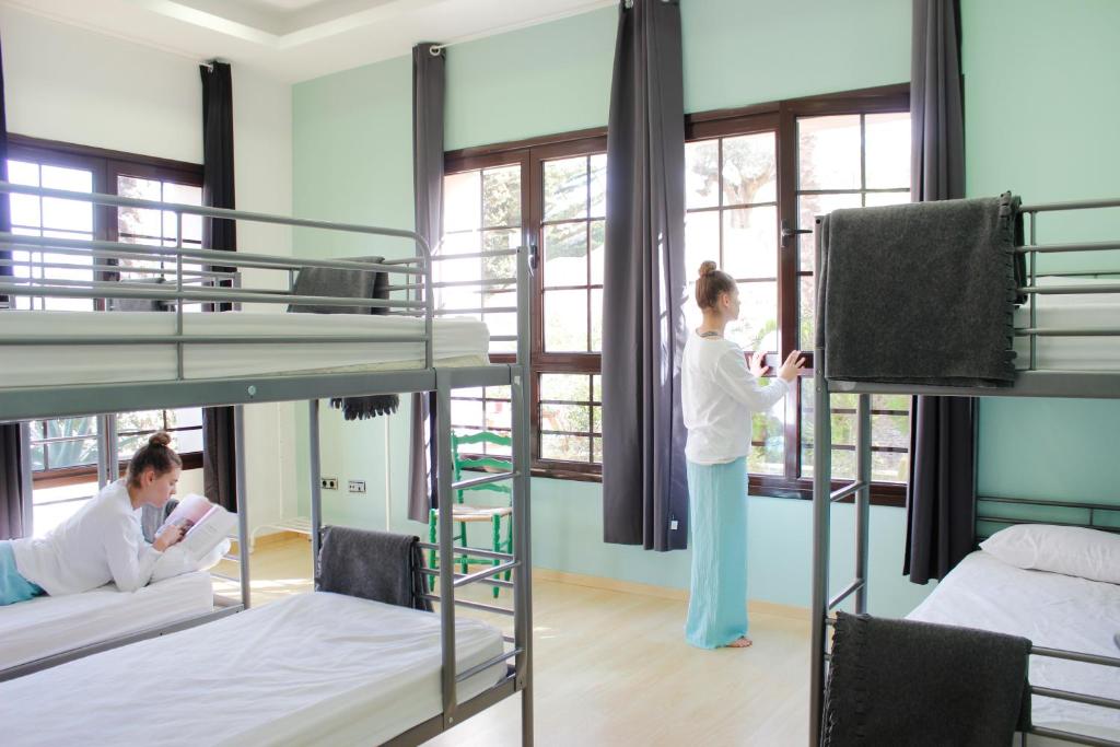 Postel nebo postele na pokoji v ubytování Hostel Águilas Isla del Fraile