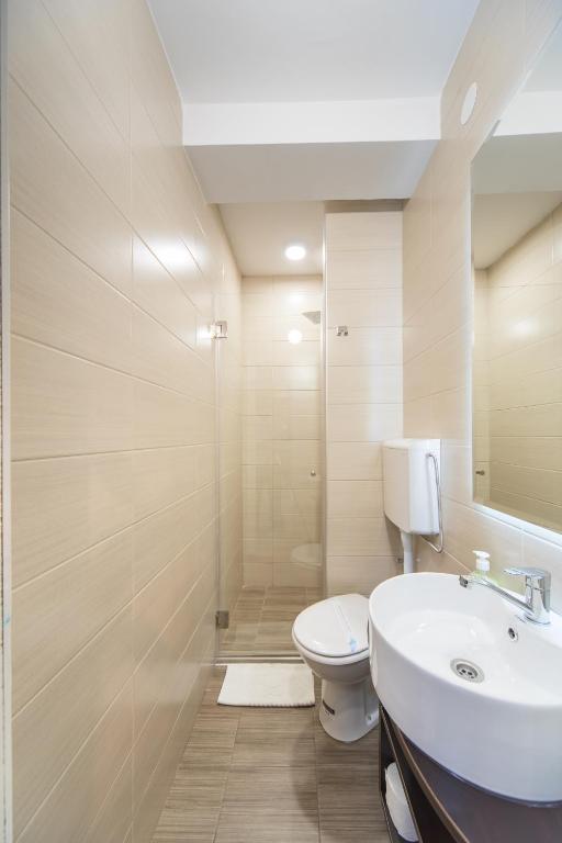 Koupelna v ubytování Garni Hotel President de Luxe