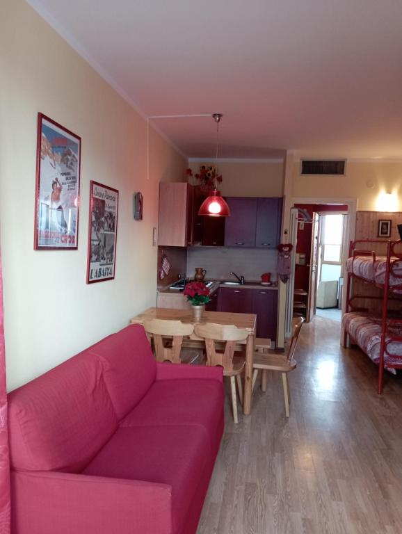 Ένα ή περισσότερα κρεβάτια σε δωμάτιο στο Casa vacanze Biancaneve