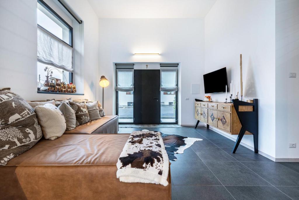 TV a/nebo společenská místnost v ubytování Loft Casa Facco