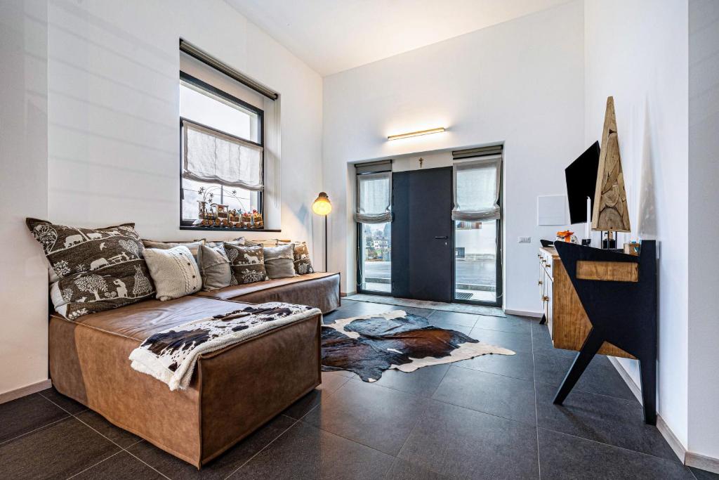 TV a/nebo společenská místnost v ubytování Loft Casa Facco