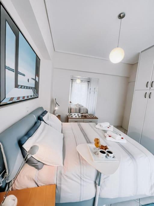 A bed or beds in a room at Mare Marina View 1