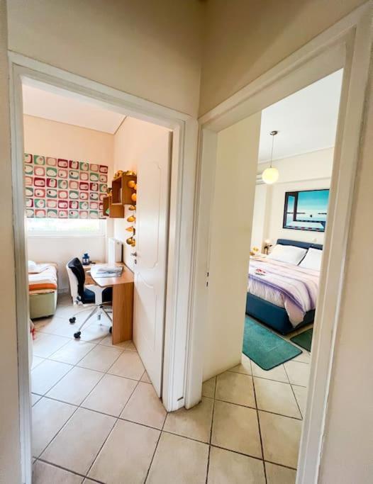 A bed or beds in a room at Mare Marina View 1