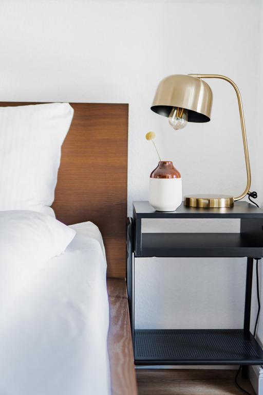 Postel nebo postele na pokoji v ubytování 360 Grad Hotel & Bar