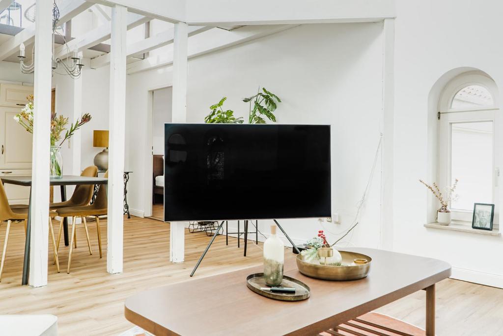 TV a/nebo společenská místnost v ubytování 360 Grad Hotel & Bar