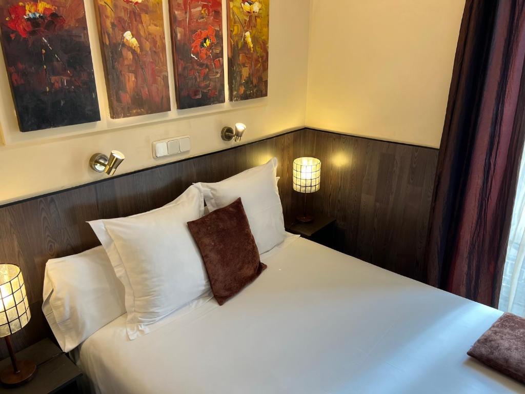 Postel nebo postele na pokoji v ubytování THC Bergantin Hostel