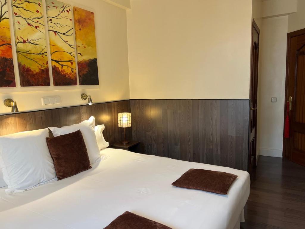 Postel nebo postele na pokoji v ubytování THC Bergantin Hostel