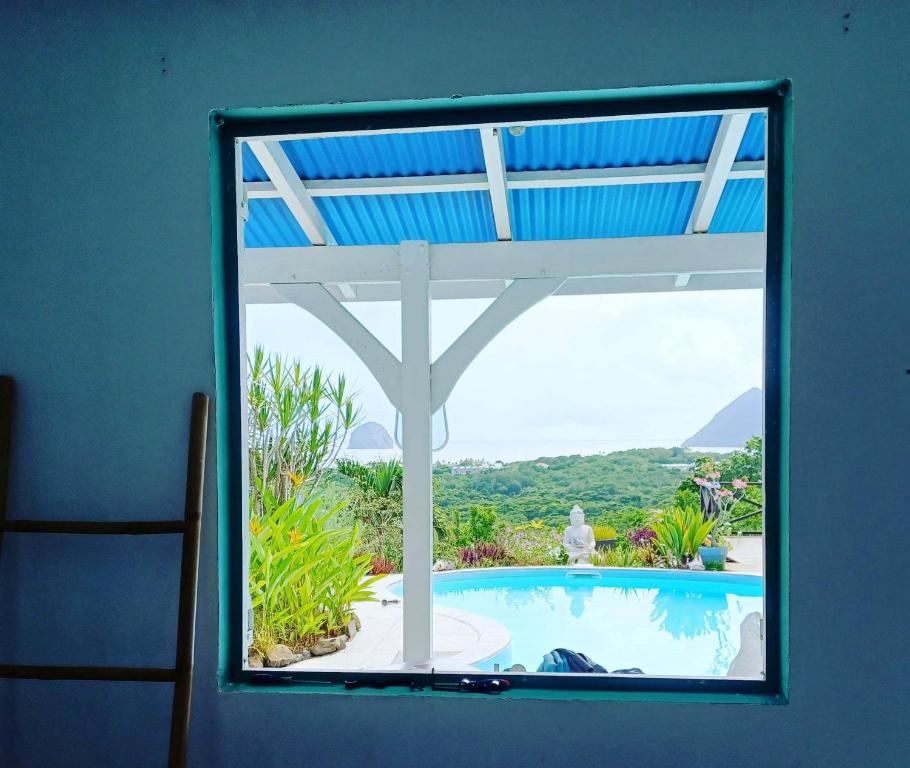 Bazén v ubytování TI coin de paradis Frangipanier nebo v jeho okolí