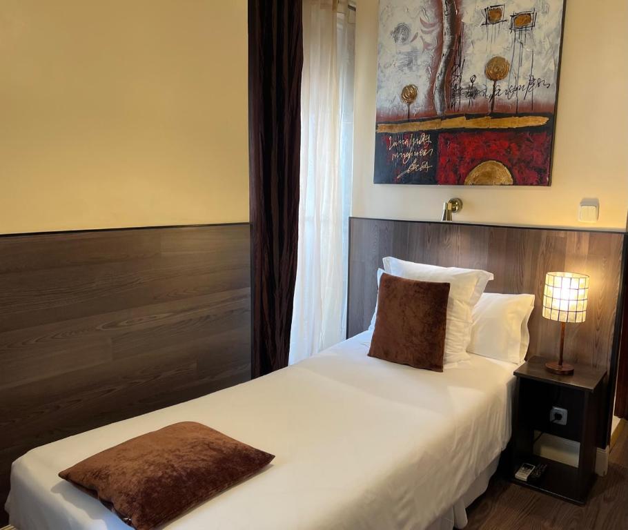 Postel nebo postele na pokoji v ubytování THC Bergantin Hostel