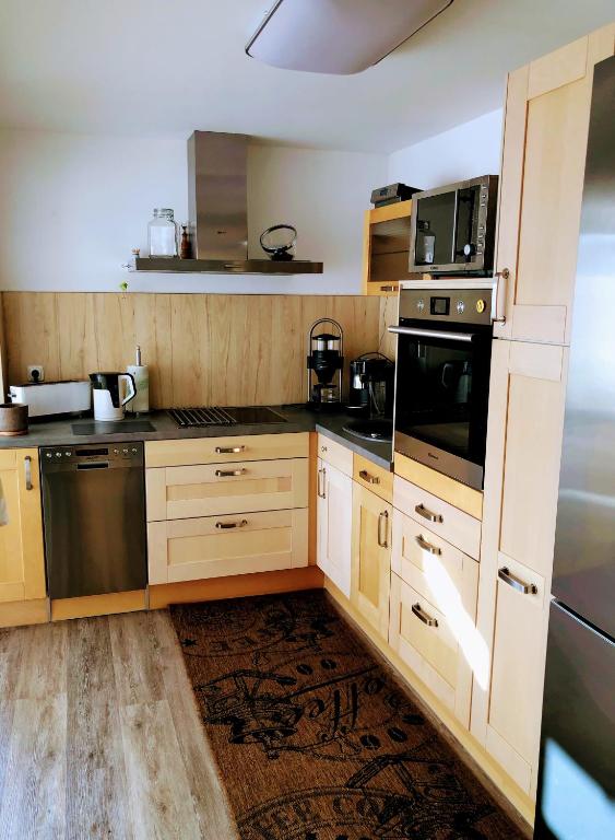 Kuchyň nebo kuchyňský kout v ubytování Casa „Ella“