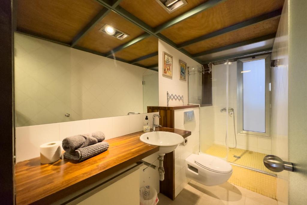 Koupelna v ubytování ApartEasy - Central Gracia Apartments