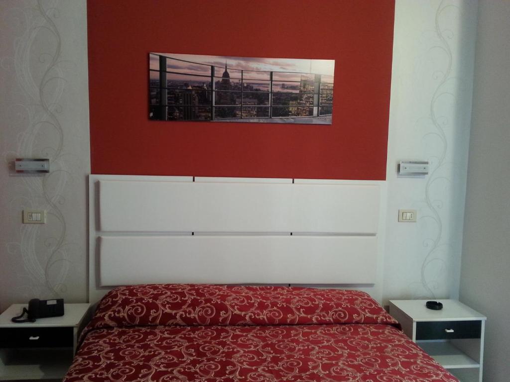 Letto o letti in una camera di Hotel Mizar