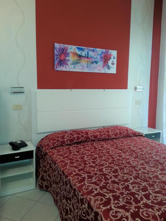 Letto o letti in una camera di Hotel Mizar