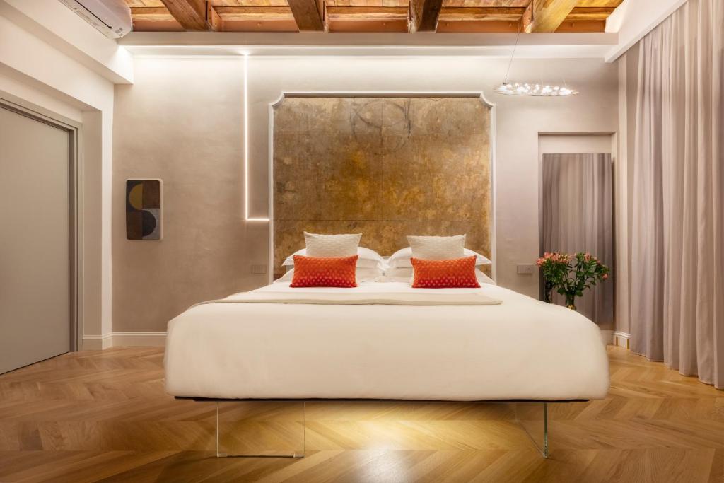 Posteľ alebo postele v izbe v ubytovaní Poēsis Experience Hotel