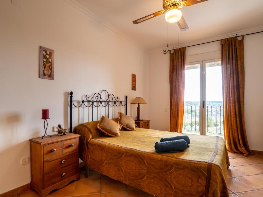 A bed or beds in a room at Casa Esperanza