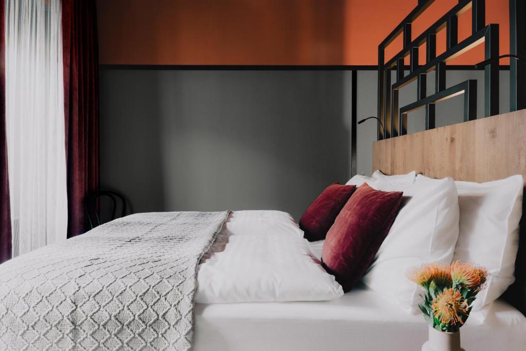 WELTWIEN Luxury Art Apartments & Free Parkingにあるベッド