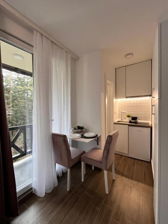 Apartmani Divila 주방 또는 간이 주방