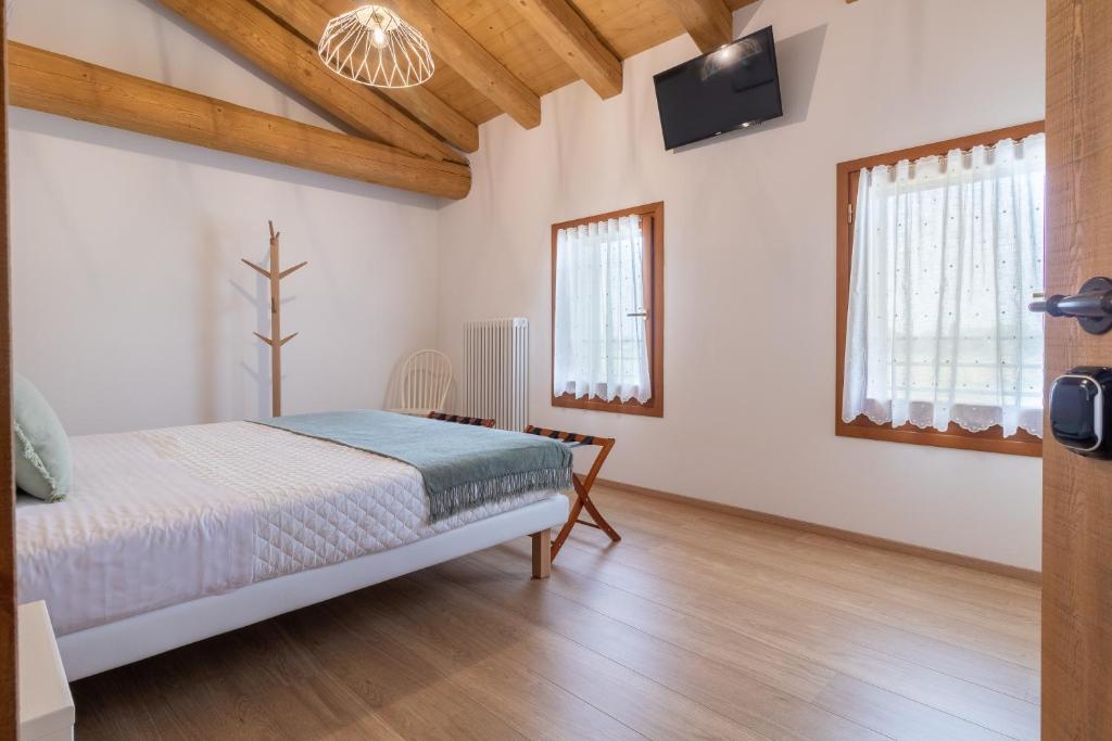 Posteľ alebo postele v izbe v ubytovaní Agriturismo Fondo Gioconda