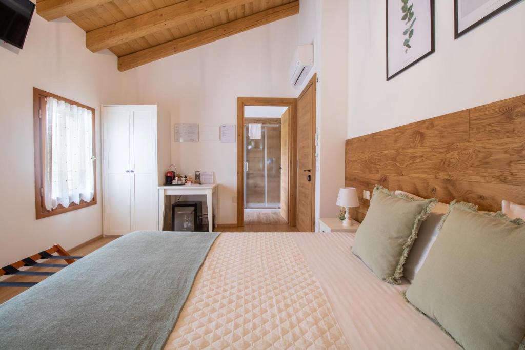 Posteľ alebo postele v izbe v ubytovaní Agriturismo Fondo Gioconda
