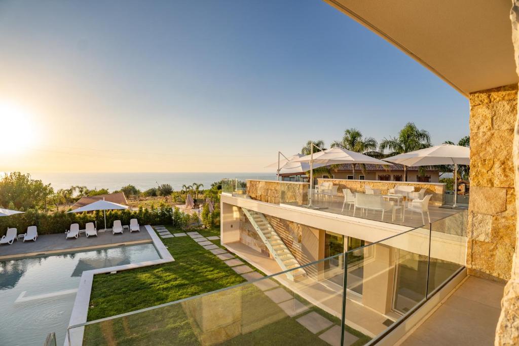 an aerial view of a house with a pool at Villa Rocca - Rooms&SPA in Pizzo