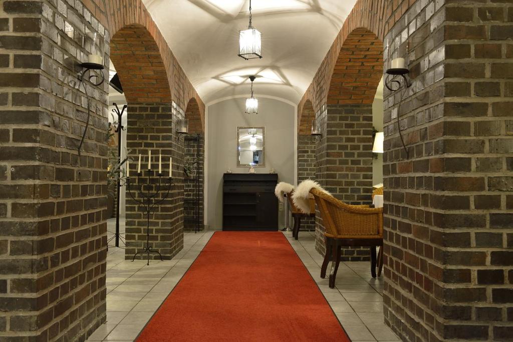 Posezení v ubytování Land- und Golfhotel Alte Fliegerschule
